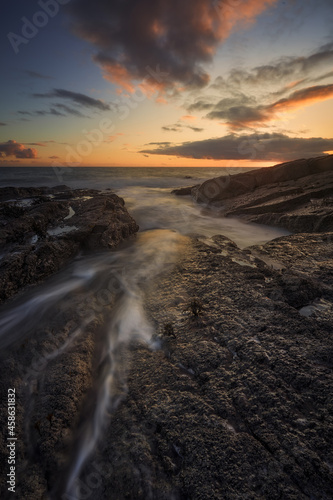Rathmoylan Cove, Waterford, Ireland. Stunning rocks and sunset.