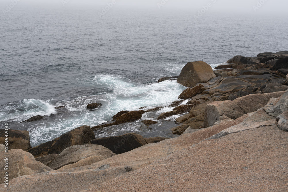 Waves crashing on a rocky shore on the Atlantic ocean Waves crashing on a rocky shore on the Atlantic ocean