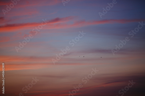 Red clouds after sunset. Beautiful sunset. © vov8000