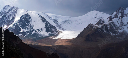 View with snow-capped peaks of mountains.