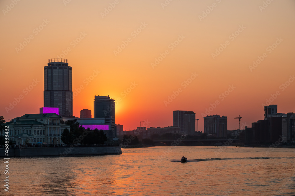 Sunset on a pond in the center of the city. Yekaterinburg, Russia Sunset on a pond in the center of the city. Yekaterinburg, Russia