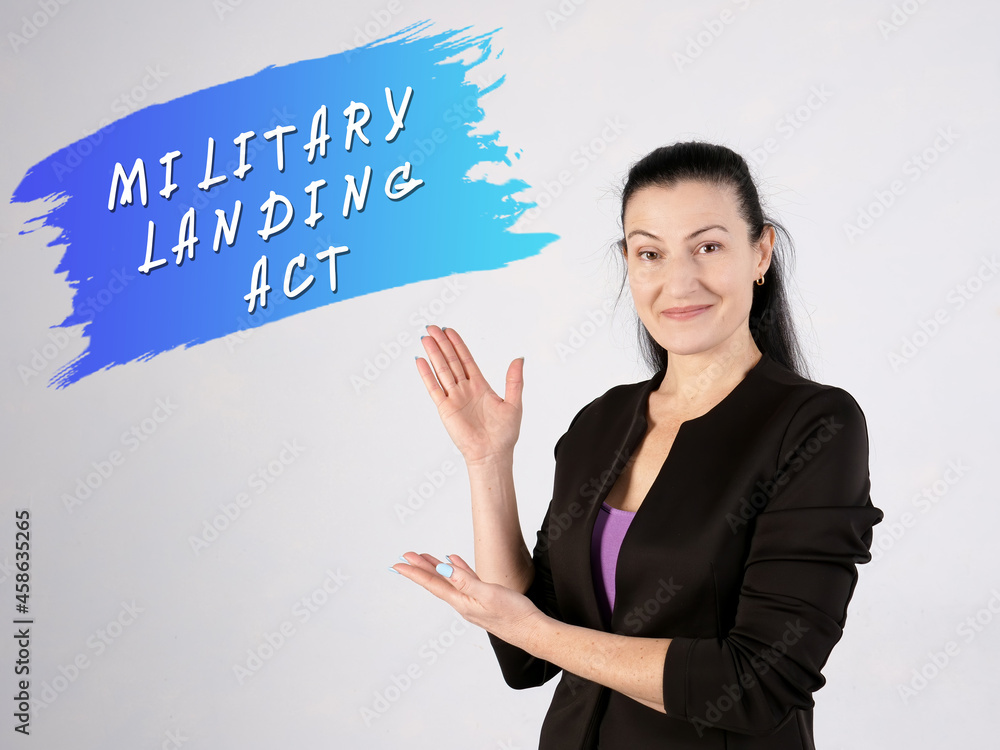 Financial concept about MILITARY LANDING ACT with phrase on the gray wall