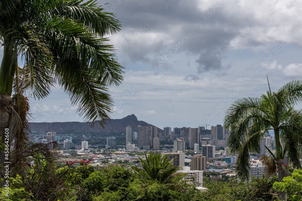 Scenic aerial Honolulu vista with the Diamond Head in the background on a rainy day, Oahu, Hawaii