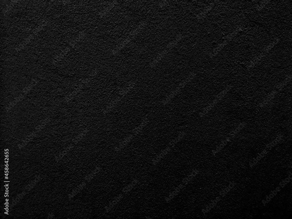 Black color paint on Cement wall concrete textured background abstract material rough surface Black color paint on Cement wall concrete textured background abstract material rough surface