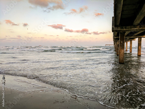 Canvas-taulu Sunset at a pier on the gulf coast