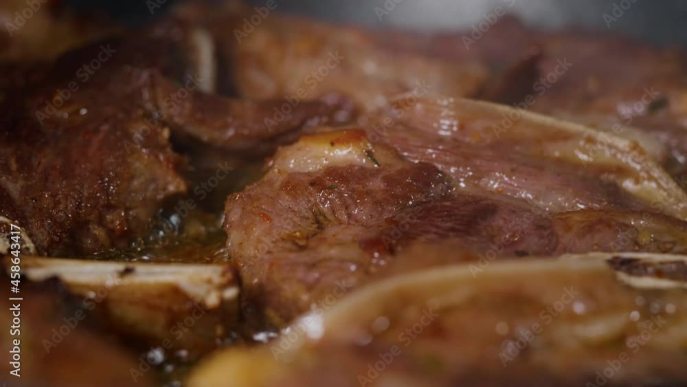 Close Up Tasty Meat Frying. Appetizing Lamb Dish. Slow Motion. Macro Footage about Food. Close Up Tasty Meat Frying. Appetizing Lamb Dish. Slow Motion. Macro Footage about Food.
