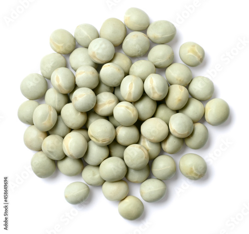 uncooked dried green peas isolated on the white background, top view