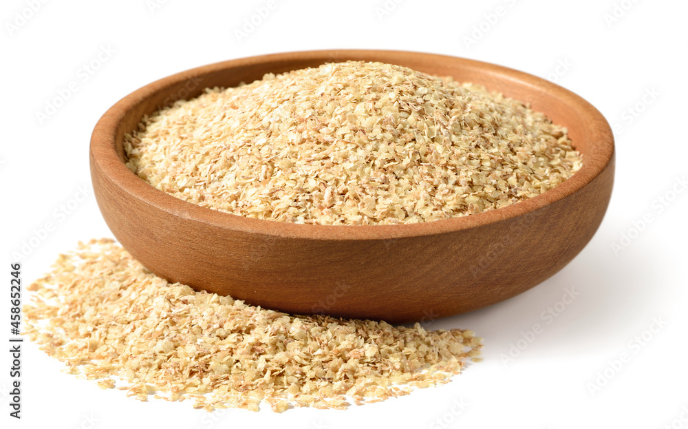 uncooked wheat germ in the wooden bowl, isolated on the white background uncooked wheat germ in the wooden bowl, isolated on the white background