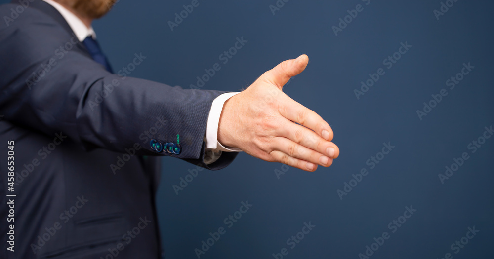 Businessman with open hand ready to seal a deal. Partner shaking hands. Businessman with open hand ready to seal a deal. Partner shaking hands.