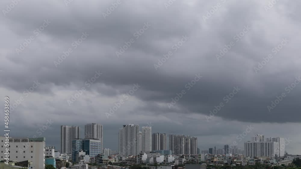 Generic urban cloudy day scene time lapse featuring high rise buildings and a range of clouds from stormy to normal Generic urban cloudy day scene time lapse featuring high rise buildings and a range of clouds from stormy to normal
