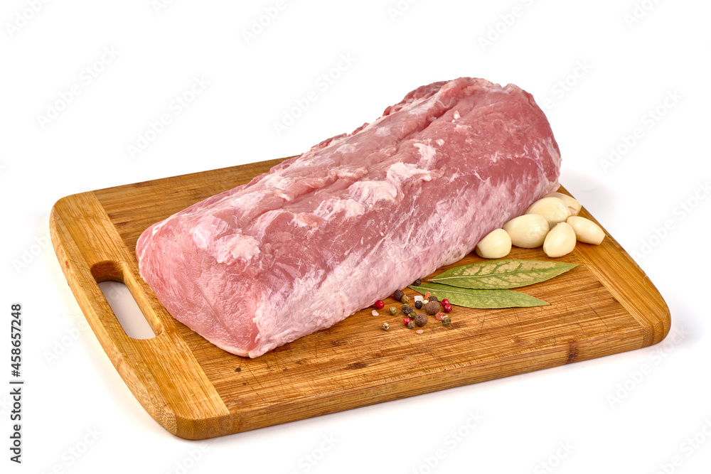 Raw pork loin with condiments, isolated on white background.