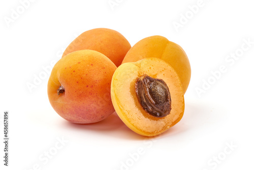 Sweet juicy yellow apricots, ripe nectarines, isolated on white background.
