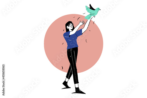 Girl releasing bird, concept of sending message