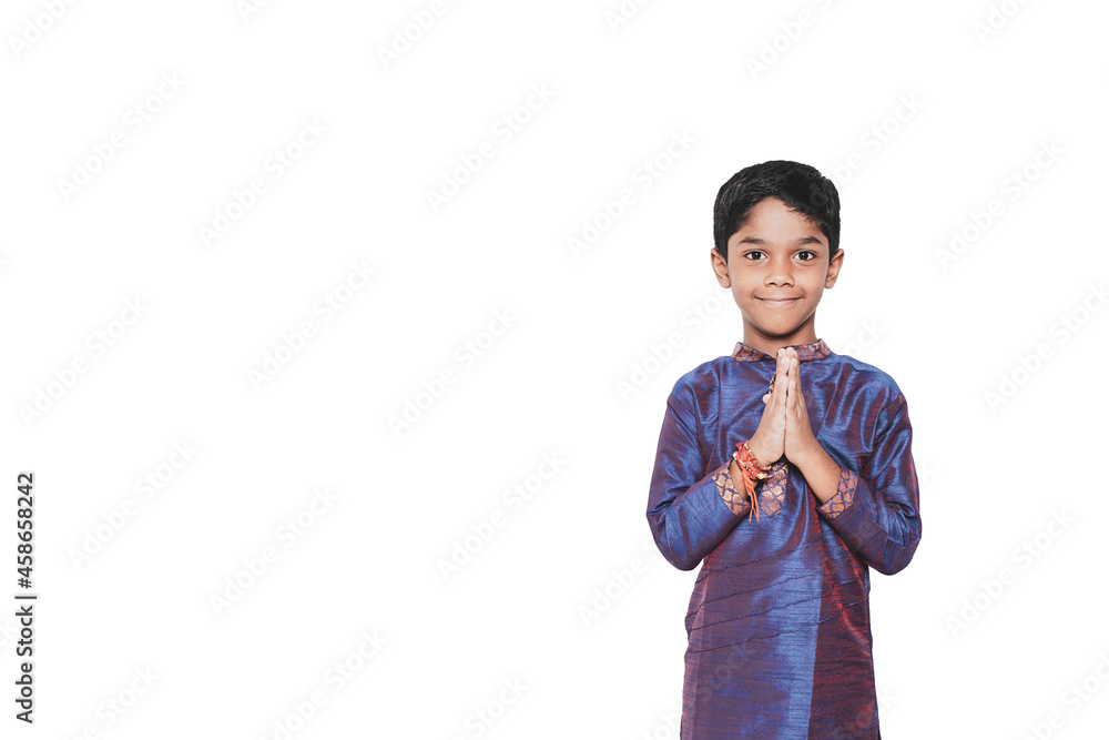 Indian Little Boy in traditional wear and praying Indian Little Boy in traditional wear and praying