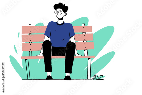 Boy alone sitting on bench