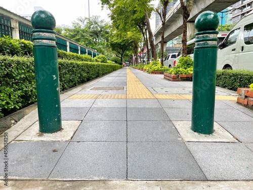 A symbolic pedestrian walkway to help those who can't see but can't continually build to perfection.
