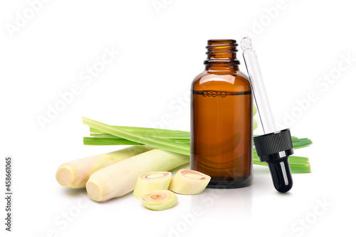Canvas Print lemongrass essential oil extract in amber dropper bottle with fresh lemongrass isolated on white background