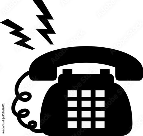 ベルが鳴っている黒い固定電話