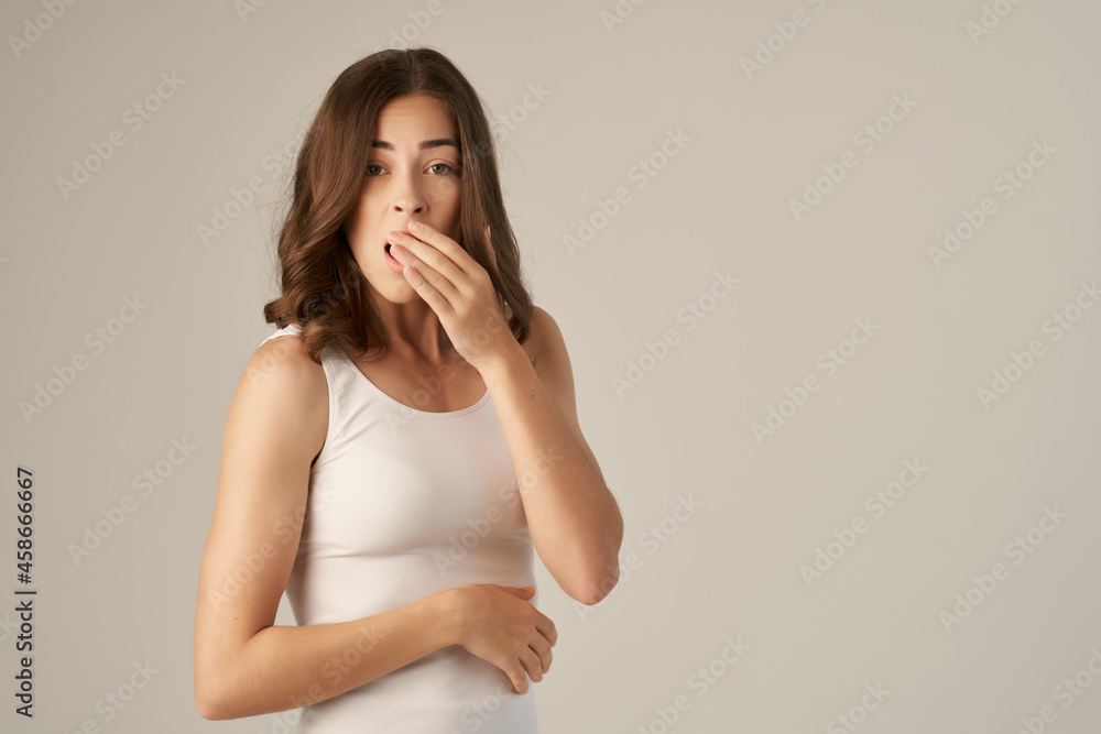 beautiful woman in a white t-shirt hair care isolated background beautiful woman in a white t-shirt hair care isolated background
