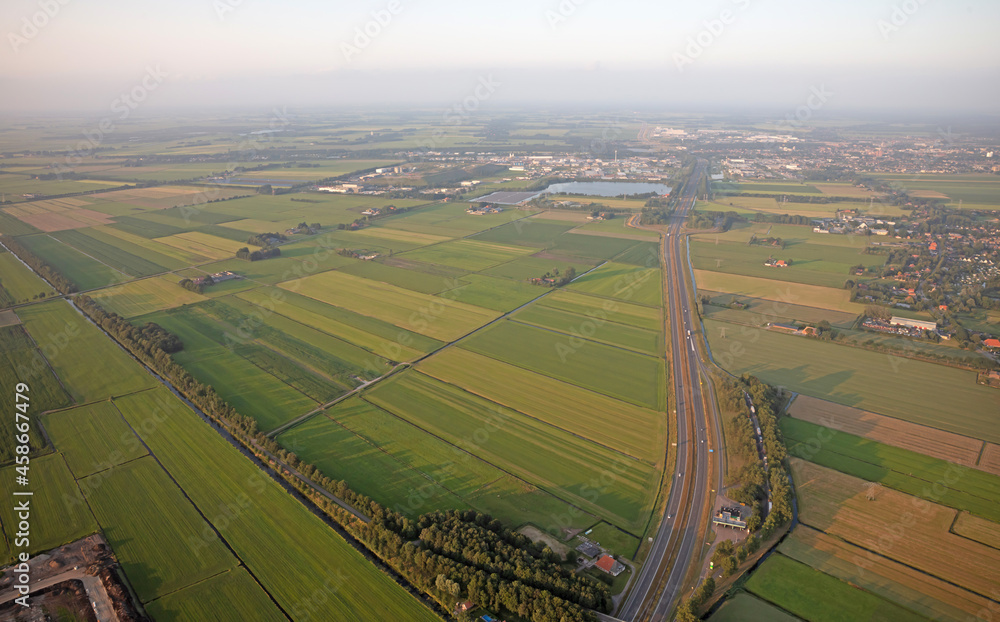 Agricultural landscape of Friesland, one of the northern provinces of the Netherlands - Friesland from above - Highway Agricultural landscape of Friesland, one of the northern provinces of the Netherlands - Friesland from above - Highway