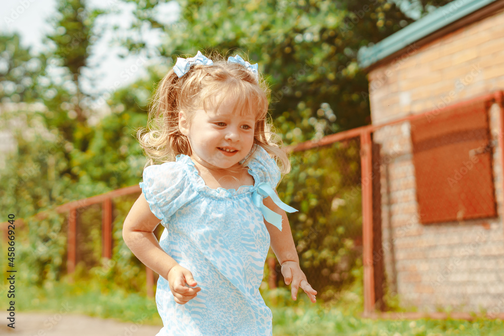 portrait of a little girl in nature portrait of a little girl in nature