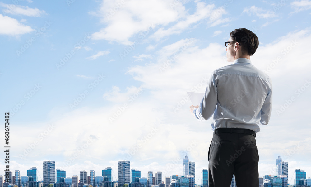 Concept of business success and control with confident boss against cityscape background Concept of business success and control with confident boss against cityscape background