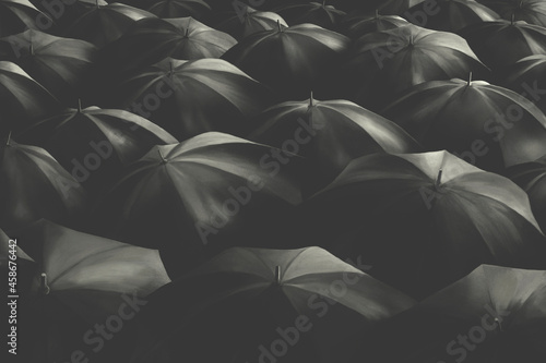 Bild auf Leinwand Illustration of multitude of black umbrellas, business minimal dark solution con