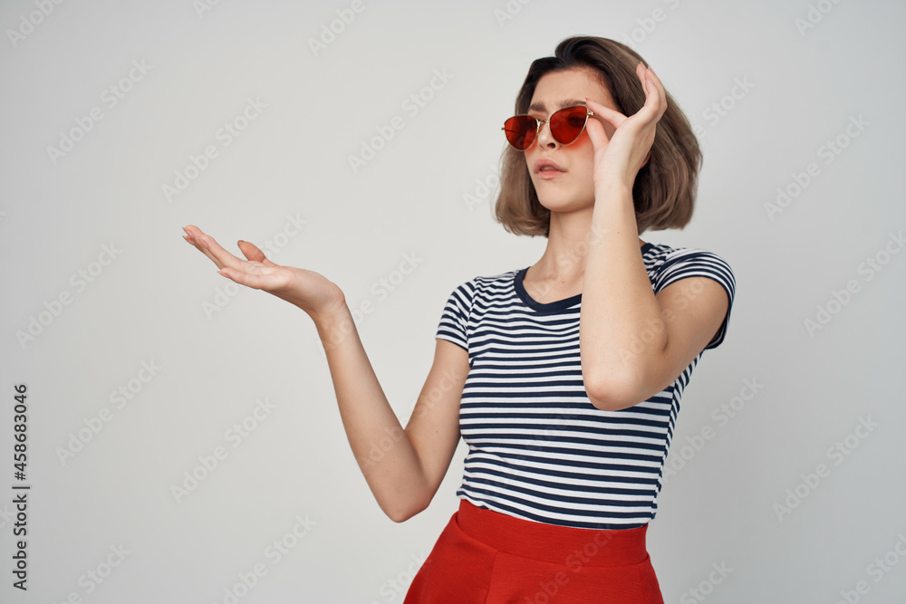 woman wearing sunglasses red skirt fashion summer posing woman wearing sunglasses red skirt fashion summer posing