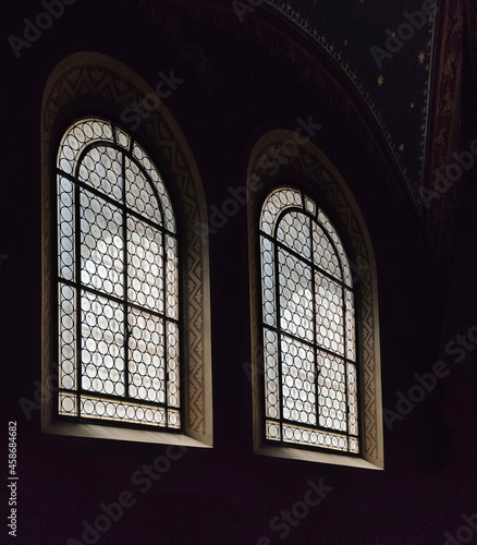 two ancient windows with leaded glass