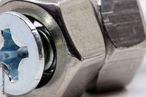close-up nuts and bolts isolated on white background