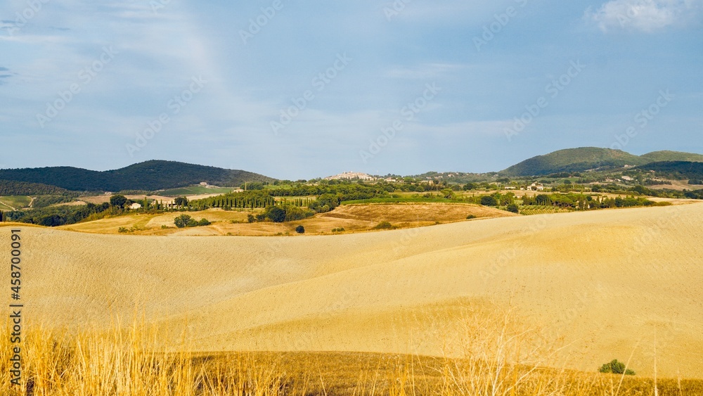 landscape with a field and sky in Tuscany Italy