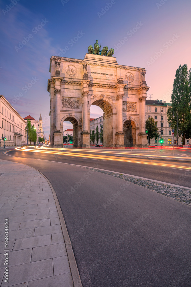 Munich, Germany. Cityscape image of Munich, Bavaria, Germany with the Siegestor at summer sunset.