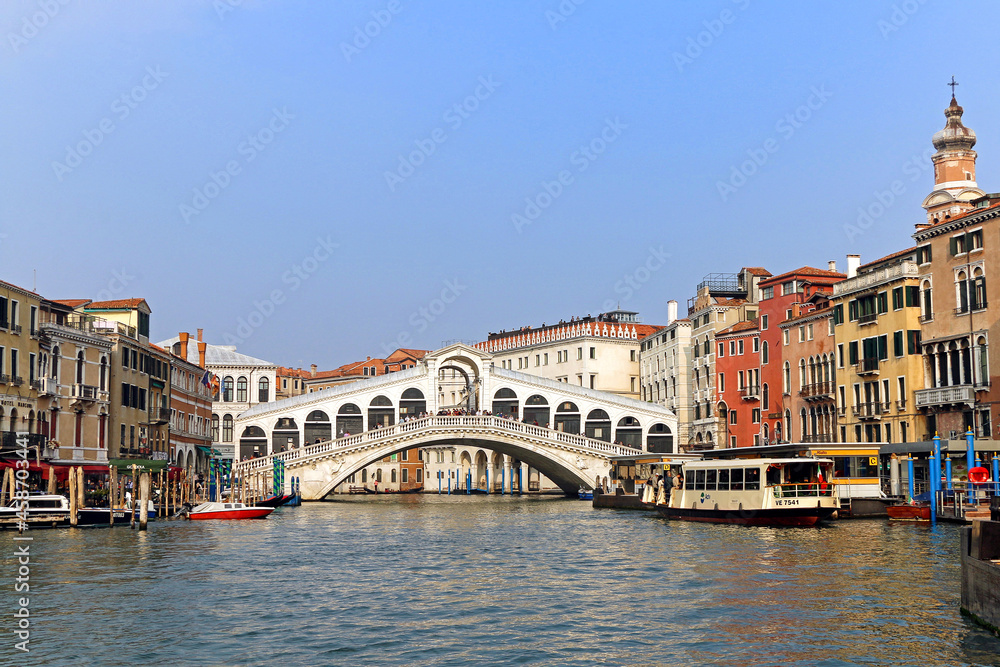 Rialto bridge view from boat on Grand Canal.