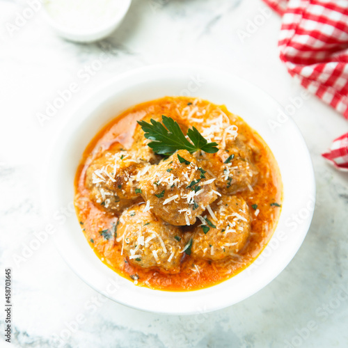 Meatballs with tomato sauce and cheese