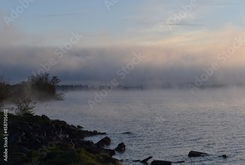 Early morning mist on Keweenaw Bay at Baraga Michigan in mid-September photo