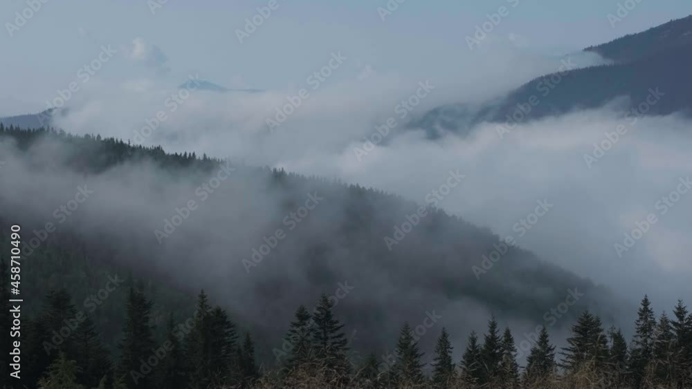 Panoramic video clip of Carpathian mountains in heavy mist. Fog rolling on hills of Carpathians Panoramic video clip of Carpathian mountains in heavy mist. Fog rolling on hills of Carpathians