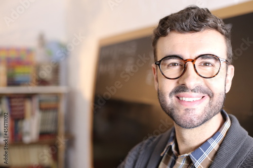 Teacher wearing eyeglasses close up