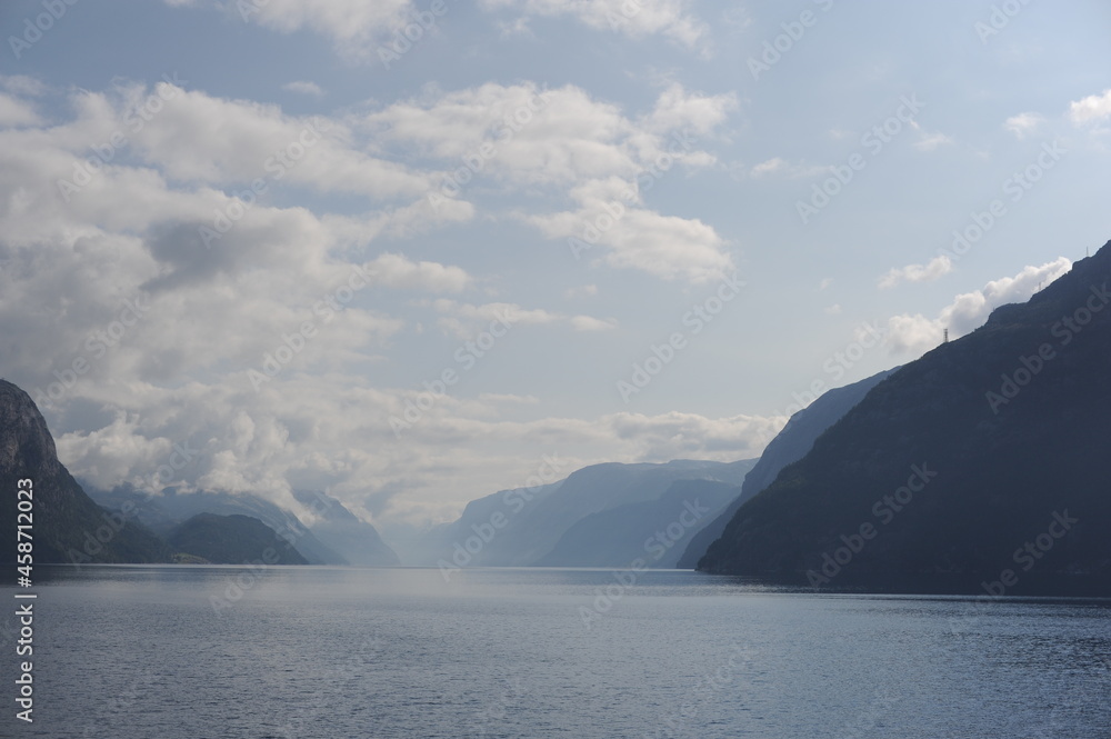 Dramatic panorama of Lysefjord (Lysefjorden) fjord canyon landscape in Norway on a cloudy day in summer 