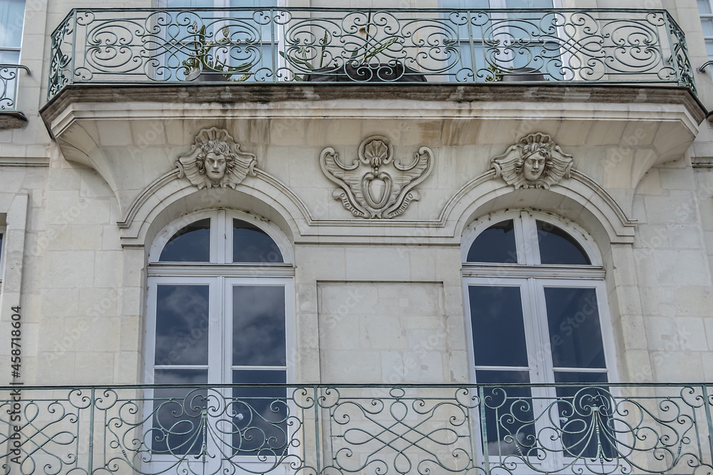 Architectural fragments of beautiful facades on Nantes Quai Turenne. Nantes, Loire Atlantique, France.