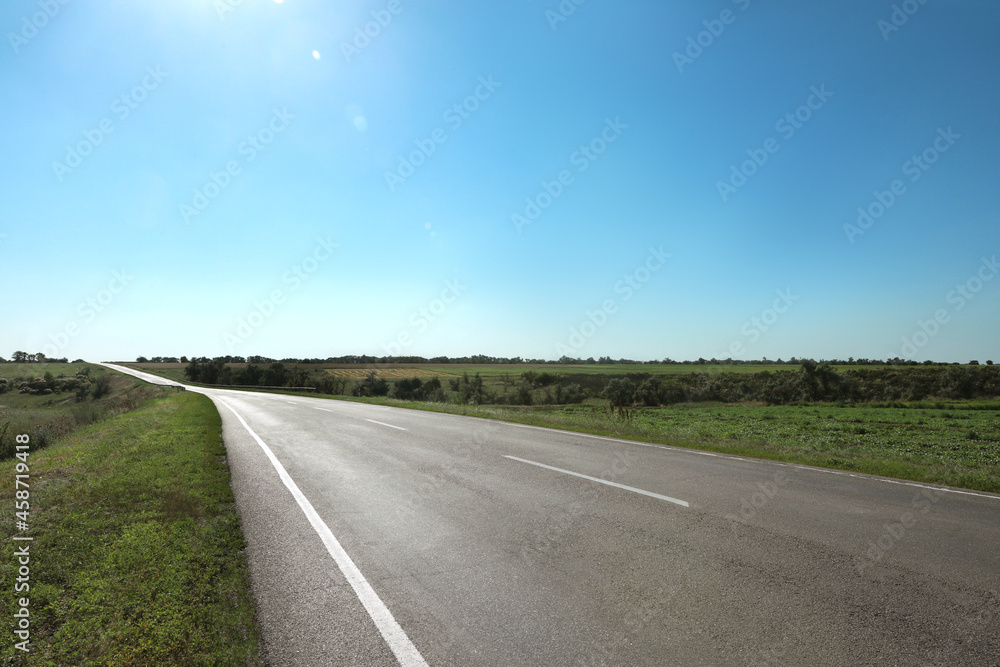 View of asphalt road on sunny day