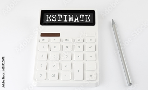 ESTIMATE business text on the calculator with pencil