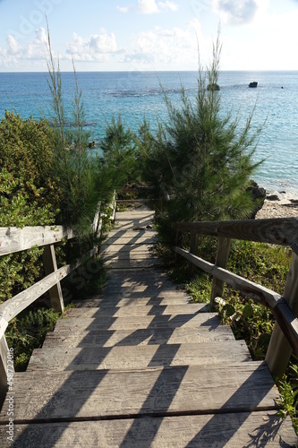 Stairway leading down to tropical Caribbean beach, Church Bay, Bermuda
