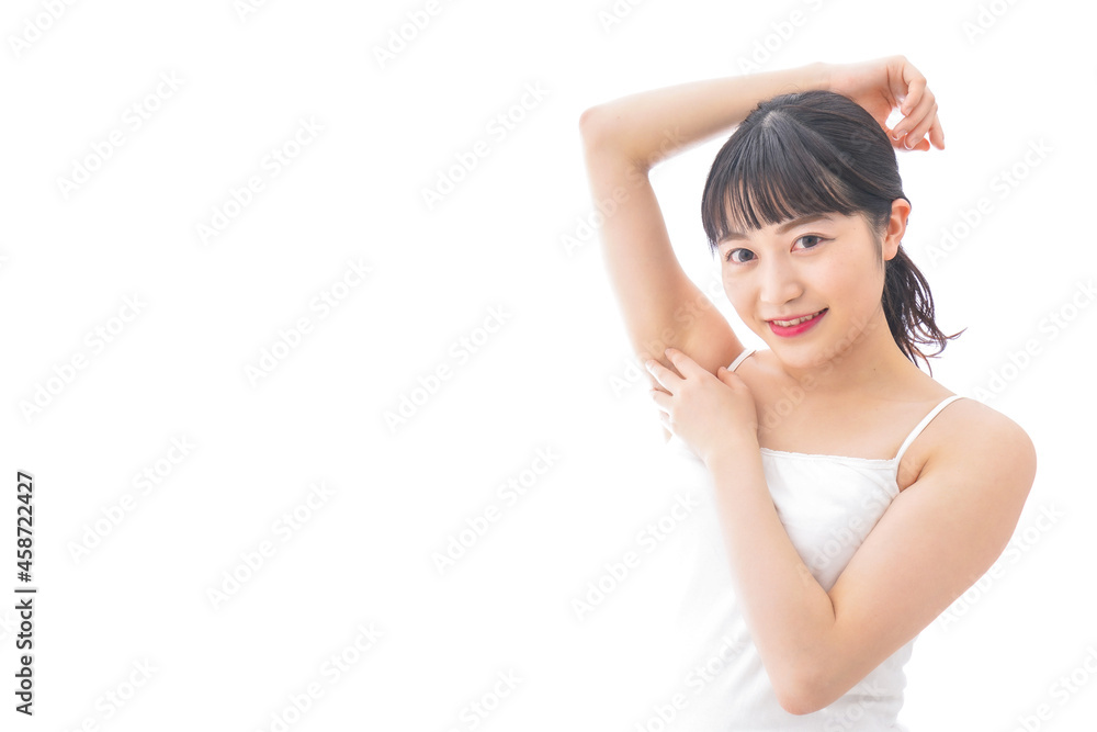 ワキを気にする若い女性 ワキを気にする若い女性