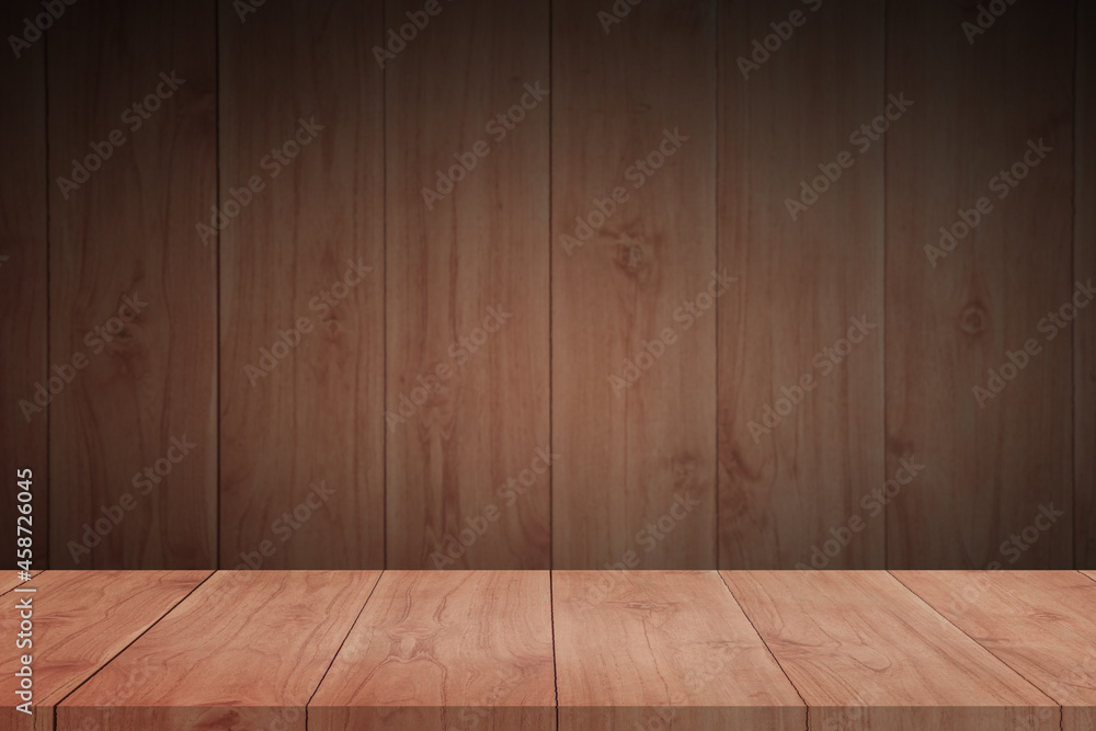 Empty space on wooden table for displaying products with blurred wooden wall background.
Empty space on wooden table for displaying products with blurred wooden wall background.