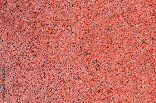 Close up of red asphalt road texture background