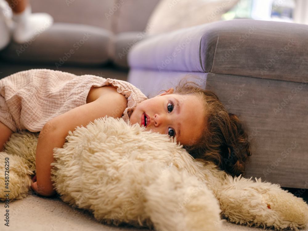 Baby girl playing with stuffed toy Baby girl playing with stuffed toy