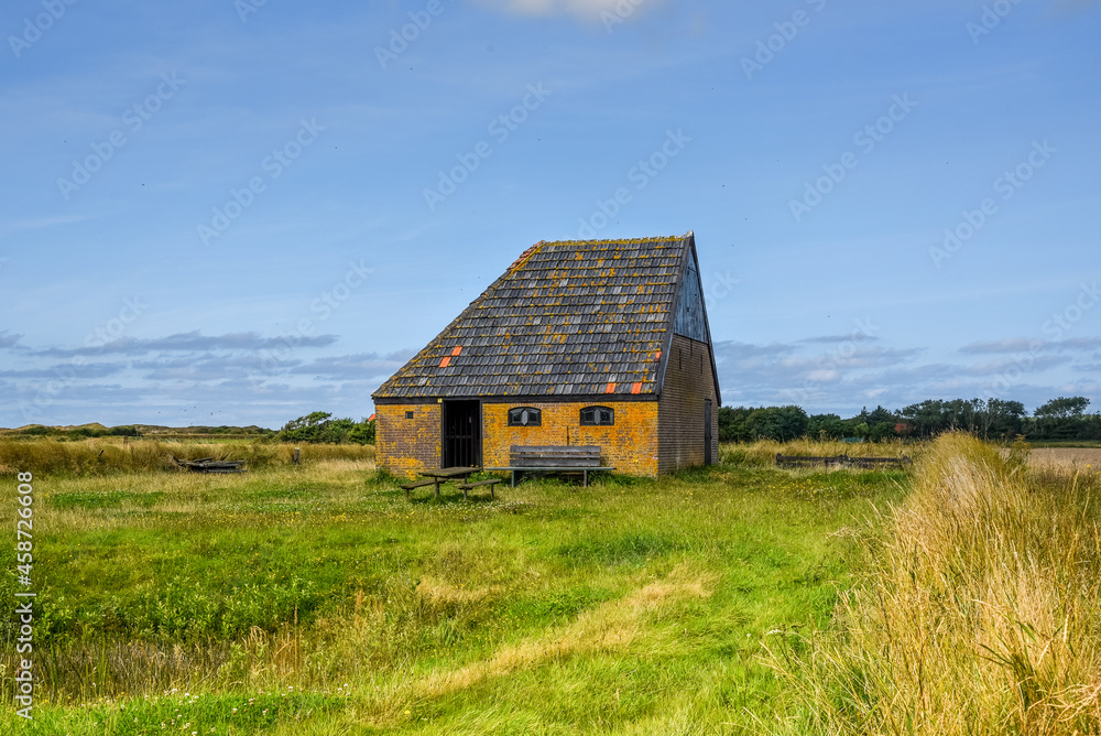 Texel, the Netherlands, August 2021. Autenthic barn for sheep on the isle of Texel. Texel, the Netherlands, August 2021. Autenthic barn for sheep on the isle of Texel.