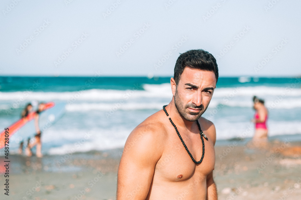 Surf beach fun surfer man. Surfing in Spain. Young sport athlete