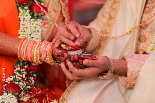 indian wedding full story with bridal and groom start to end with fashion & tasty food, jewelry & decoration saptapadi samayu javtal ganesh Puja beautiful background all wedding rituals sindur photo