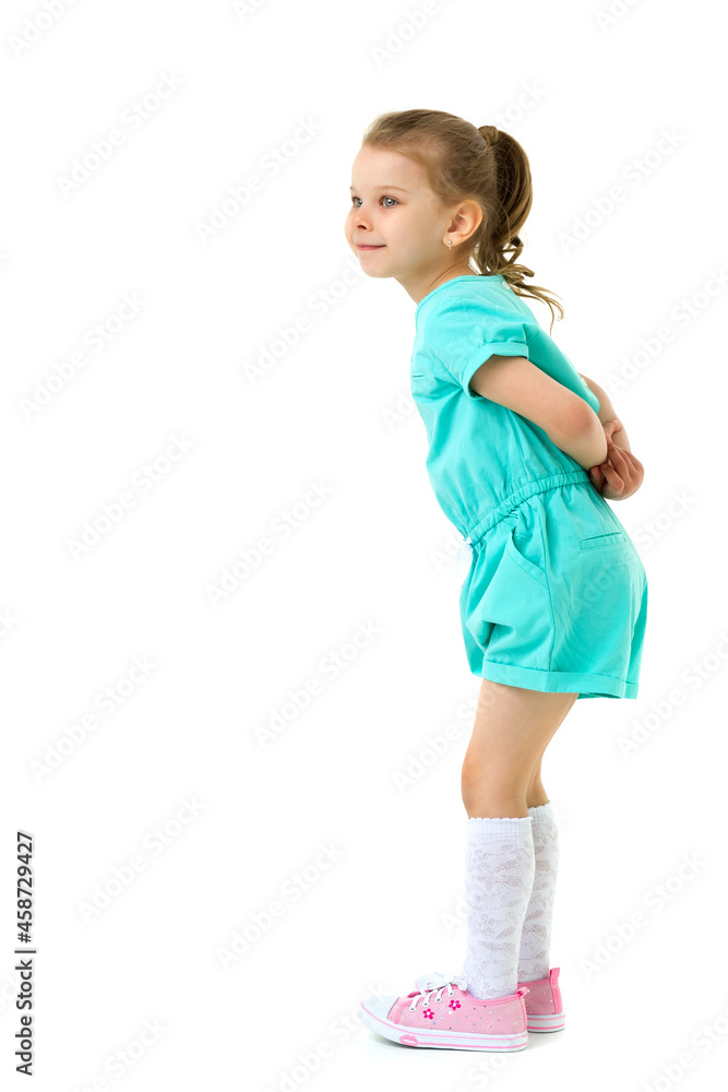 Lovely little girl with hands behind her back Lovely little girl with hands behind her back